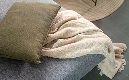 Килимите, одеялата и възглавниците придават hygge стил