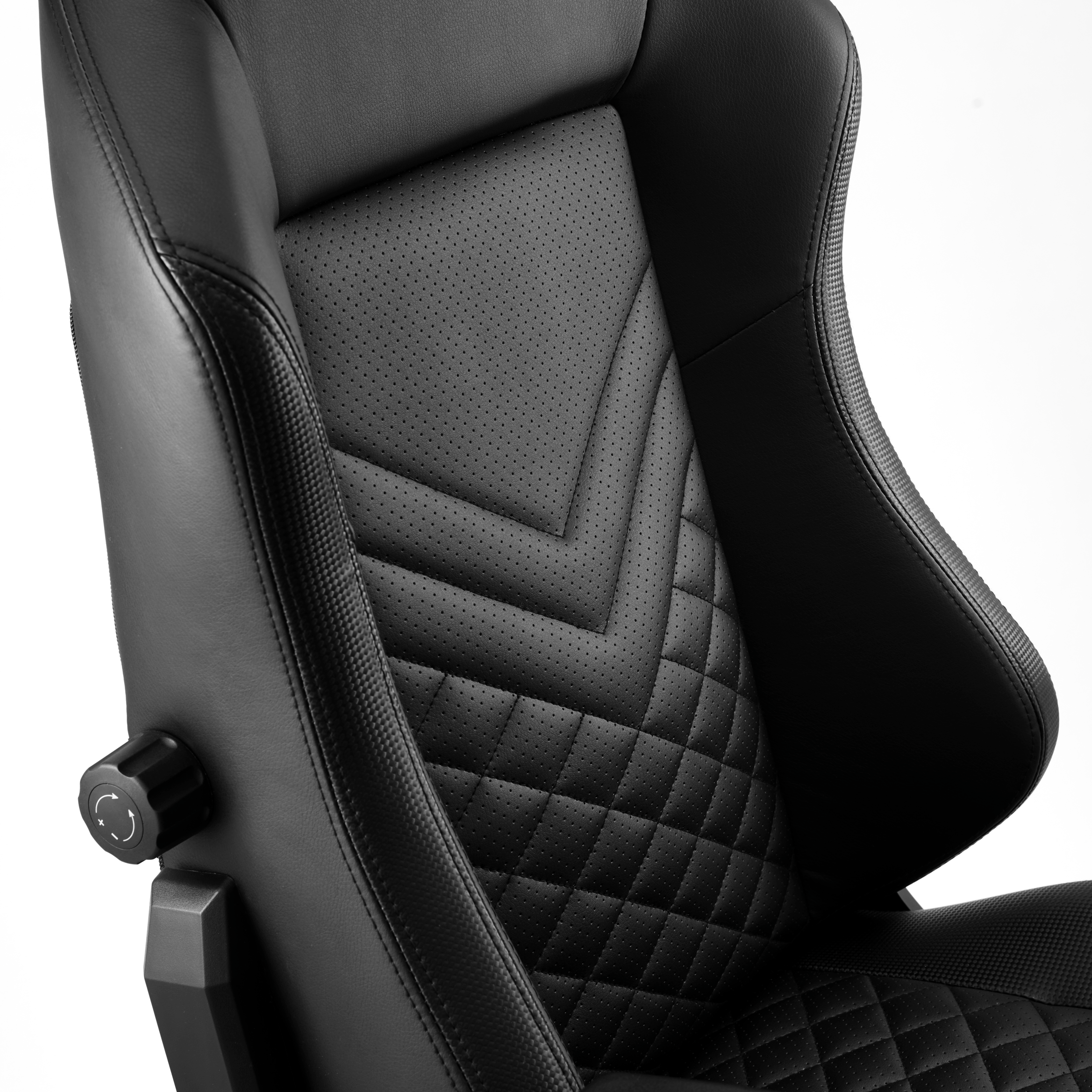 A gaming chair with lumbar support built into the backrest